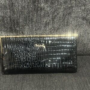 Elegant Black Crocodile Pattern Clutch with Gold Trim